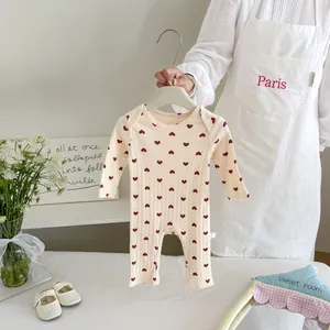 Infant baby long sleeve cotton romper featuring cute red heart pattern for autumn newborns.