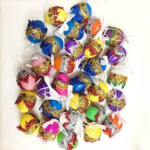 Detailed view of 6cm Bohemian style Easter eggs with colorful sequins and ribbons