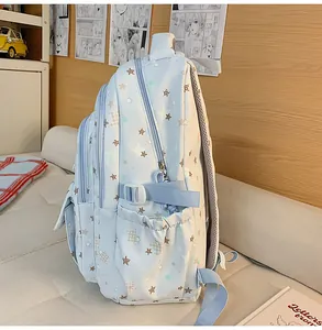 Zaino per studenti carino blu chiaro con stampa a stelle, borsa casual multi-tasca per ragazze.