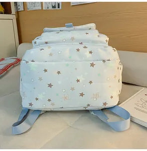 Zaino scolastico blu con stampa di stelle per ragazze, grande capacità, borsa casual.