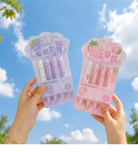 Gros plan d'un lot de 4 stylos gel rétractables sur le thème des fruits au ciel