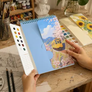 Portable creative watercolor painting book set with 12 built-in colors for art.
