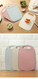 Detail view of thickened wheat straw cutting boards in three pastel colors