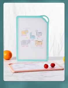 Detailed view of cartoon animal cutting boards with non-slip edges and hanging hole