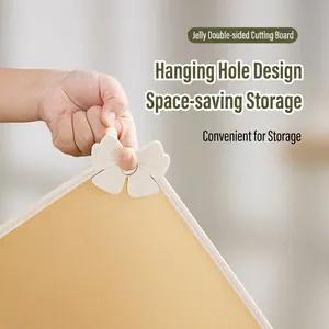 Premium double-sided kitchen cutting board with bow-shaped hanging hole for storage