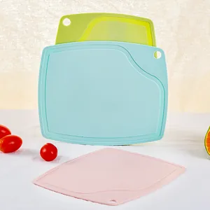 Set of three colorful food-grade PP plastic cutting boards with convenient hanging holes