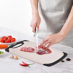 Durable wheat straw cutting board with non-slip edges for home and commercial kitchens.