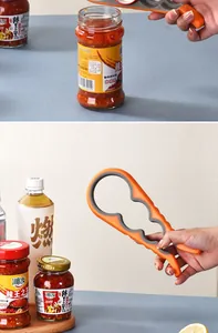 Primer plano de un abridor de tarros multifuncional naranja con agarre antideslizante