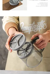 Close-up detail of hand-held semi-automatic flour sifter with fine stainless mesh