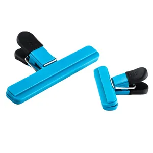 Durable set of two blue and black plastic food sealing clips for kitchen bag storage.