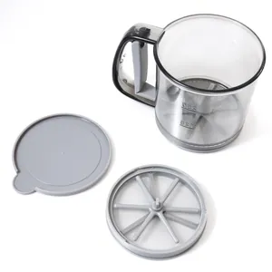 Semi-automatic handheld flour sifter tool with transparent measuring cup and lid