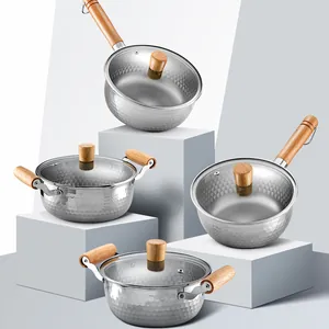 Professional hammered stainless steel Yukihira pots with wooden handles and glass lids