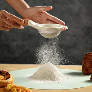 Fine mesh stainless steel flour sifter with wooden handle for baking and cooking