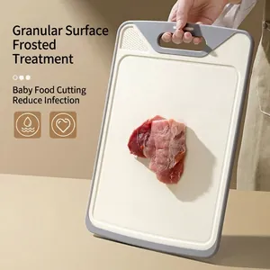 High-quality textured baby food cutting board with grey safety handle and frosted surface