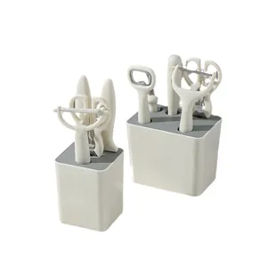 Minimalist cream 6-piece kitchen gadget set including peeler, scissors and storage base
