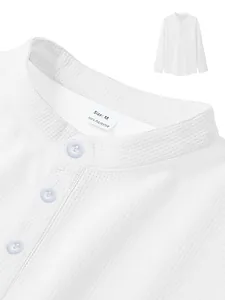 Macro view of men's white waffle knit long sleeve polo shirt showing fabric texture and buttons