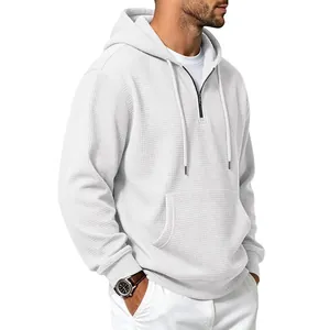 Classic men's white waffle knit hoodie featuring half-zip design and front kangaroo pocket