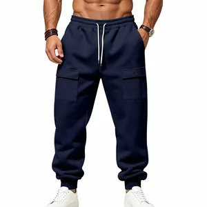 Detail view of navy fleece cargo sweatpants featuring drawstring waist and large pockets
