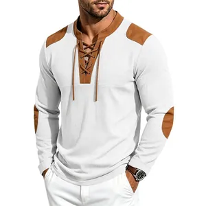 Detail view of men's white waffle knit Henley shirt with brown lace-up neck and patches