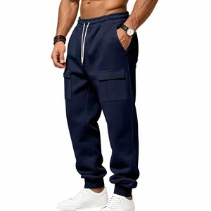 Detail view of men's navy fleece cargo joggers with drawstring waist and big pockets