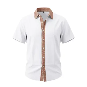 Detailed view of men's white linen shirt featuring vintage patterned collar and placket