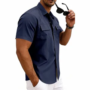 Detailed side view of navy blue men's short sleeve work shirt featuring dual chest pockets.