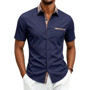 Navy blue short sleeve shirt with plaid contrast collar and pocket trim detail