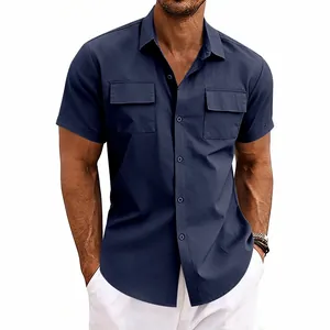 Detail view of men's navy blue short-sleeve button-down shirt with dual chest pockets