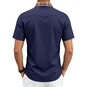 Back view of men's navy blue short-sleeved shirt with contrast check collar detail
