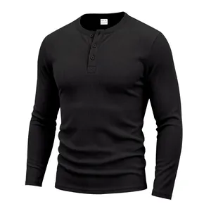 Close-up of black waffle knit Henley shirt with classic button-down collar