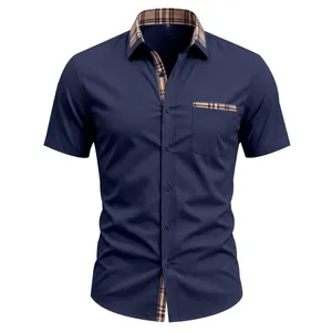 Short-sleeve navy shirt featuring a plaid contrast collar and single chest pocket