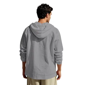 Back view of a high-quality grey cotton linen hooded long-sleeved shirt for men