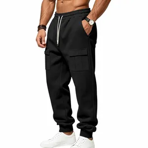 Detail view of men's black fleece cargo sweatpants with drawstring and snap pockets.