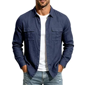 Close-up of men's navy blue linen shirt featuring double utility pockets.