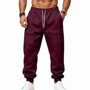 Detailed view of burgundy men's fleece cargo sweatpants with drawstring waist and snap pockets
