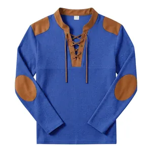 Front view of blue waffle knit medieval Henley shirt with brown shoulder and elbow patches.