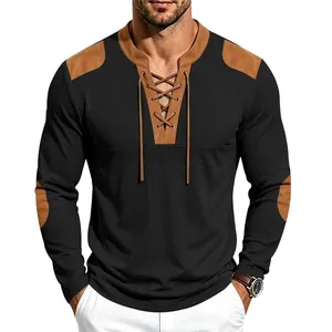 Detail showing waffle texture and brown suede lacing on men's medieval style black shirt.