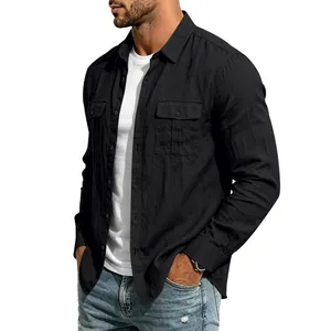 Close-up detail of men's black linen long-sleeve shirt with utility chest pockets.