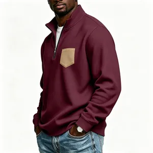 Detailed side profile of men's burgundy half-zip fleece sweatshirt with tan pocket