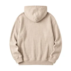 Back view of men's waffle knit hoodie showing textured fabric and ribbed hem