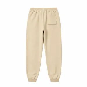 Detailed back view of men's beige fleece sweatpants with an elastic cuff and back pocket.