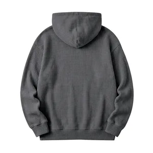 Detailed back view of men's waffle knit hoodie in charcoal grey showing fabric texture