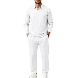 Detail view of men's white cotton linen long-sleeve polo shirt and straight pants set