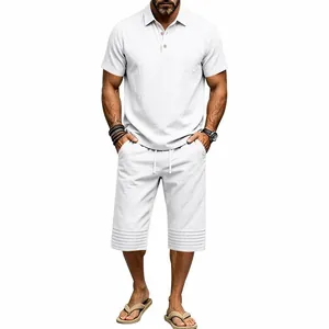 Men's white cotton linen 2-piece set featuring short sleeve polo and drawstring capris