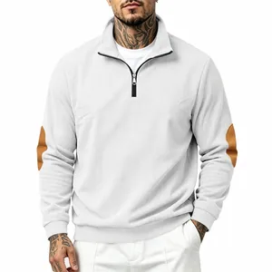Detail of men's ribbed half-zip sweatshirt with contrast elbow patches and mock neck