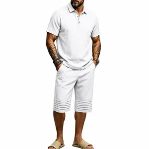 View of the full white linen summer outfit showing the relaxed fit and striped hem detail