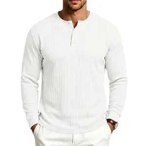 Close-up detail of white long sleeve Henley shirt with vertical braided texture