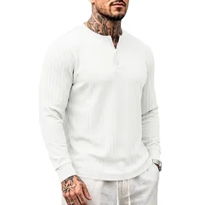 Close-up of men's white long-sleeve Henley shirt with vertical ribbed texture details