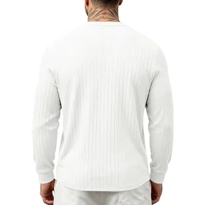 Back view of a white long-sleeve men's t-shirt with vertical ribbed texture detail.