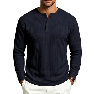 Detail of navy blue Henley shirt with vertical cable-knit texture and button placket